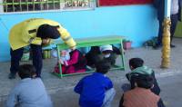 گزارش تصویری آموزش ایمنی در برابر زلزله دانش آموزان مدرسه شهید فاضلی شهر دابودشت